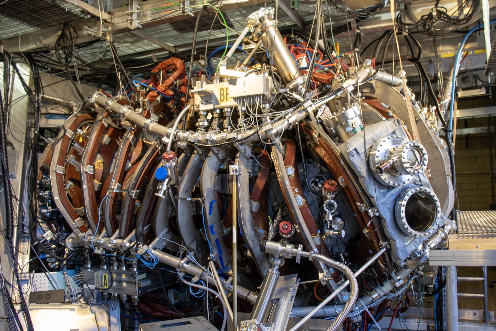 large piece of fusion science equipment with lots of intricate pieces holding it together